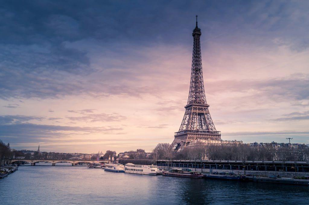 Photo by chris karidis on unsplash Eiffel Tower at sunset with the River Seine in Paris, France