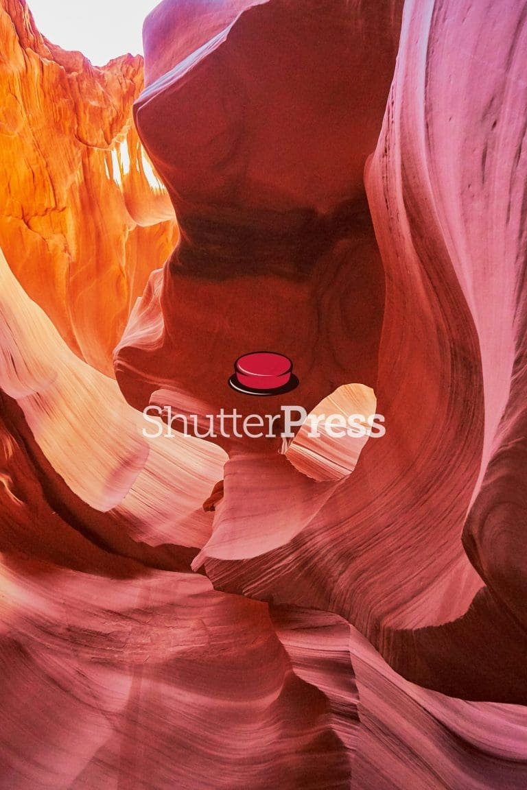 Colourful sandstone formations inside Antelope Canyon in Arizona, USA, with smooth red and orange rock walls