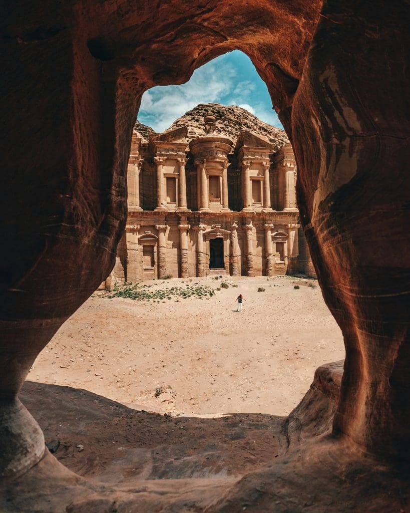 Photo by Spencer Davis on Unsplash Ancient rose rock facade carved into cliff in Petra Jordan desert